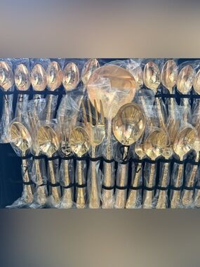 Never used- beautiful dining flatware - set if 12 in case!